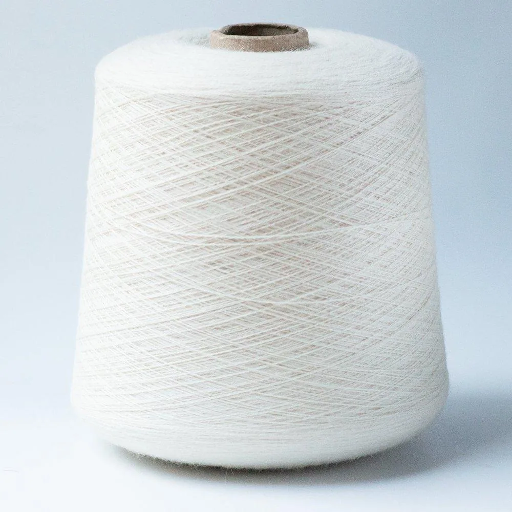 Alpaca yarn on a cone — external visual reference