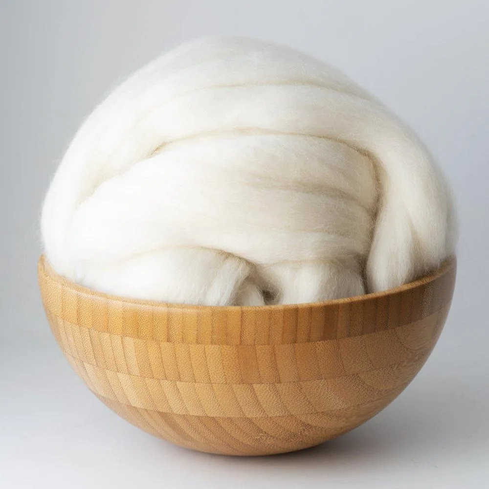 Prepared alpaca top in a basket — external visual reference
