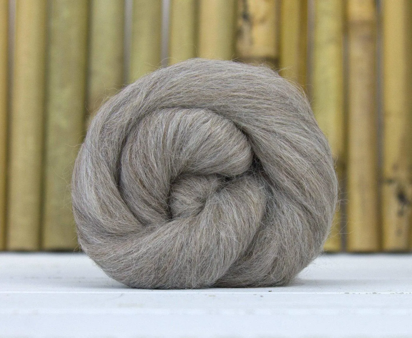 Grey combed alpaca top — external visual reference